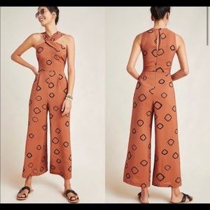Anthro faith jumpsuit in a rust brown